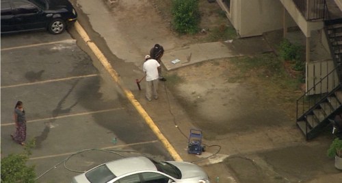 "HAZMAT cleanup crew" hard at work cleaning up Patient Zero's bodily fluids at his apartment complex. This is not Monrovia, Liberia. It is Dallas, Texas.