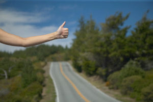Woman hitchhiking